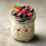 Low sugar vegan overnight oats with berries and chia