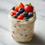 weight watchers overnight oats with berries in mason jar
