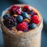 Almond butter grain free oats in jar with almond milk and chia
